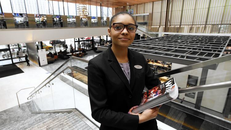 Logan Lawson-Parks, a concierge at the Hyatt Regency Hotel, says she's young and new to the industry but very passionate about the important role concierges play in Chicago. (Phil Velasquez / Chicago Tribune)
